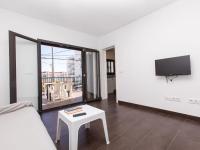 TV a/nebo společenská místnost v ubytování Apartment Estiu by Interhome