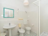 A bathroom at Apartment Girasole by Interhome