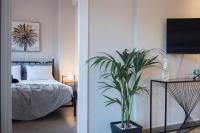 Posteľ alebo postele v izbe v ubytovaní Athens Terrace 360°