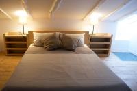 A bed or beds in a room at Via de' Falegnami 6 Apartment by Wonderful Italy