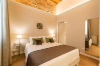 A bed or beds in a room at Atelier Altafronte