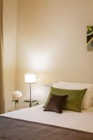 A bed or beds in a room at Atelier Altafronte