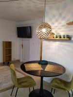 A television and/or entertainment centre at Iturri Apartment Old Town