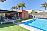 The swimming pool at or close to Par 4 Blue Star by VillaGranCanaria