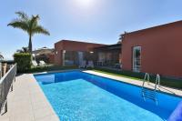 The swimming pool at or close to Par 4 Blue Star by VillaGranCanaria