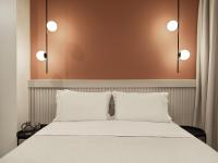 Posteľ alebo postele v izbe v ubytovaní Athens City View Urban Suites