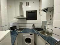 A kitchen or kitchenette at Premium Center Alameda