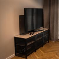 Televízia a/alebo spoločenská miestnosť v ubytovaní Urban Space Apartament 86 - Free parking