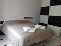Posteľ alebo postele v izbe v ubytovaní Apartamento en urb primera linea de playa