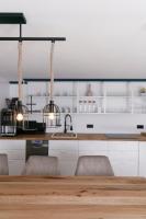 A kitchen or kitchenette at KRACHER Landhaus No 3 - inklusive Pool