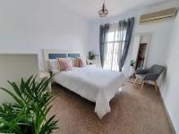 Posteľ alebo postele v izbe v ubytovaní Apartamento Centro Peña de los Enamorados