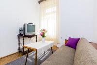 TV a/nebo společenská místnost v ubytování Apartment Lucy