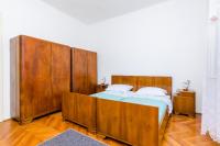 Postel nebo postele na pokoji v ubytování Apartment Lucy