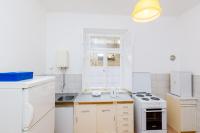 Kuchyň nebo kuchyňský kout v ubytování Apartment Lucy