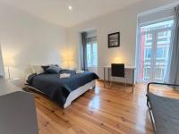 Postel nebo postele na pokoji v ubytování Lisboa Sweet Family Homestay