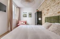 Ein Bett oder Betten in einem Zimmer der Unterkunft Splendid Parisian Flat 5P - Montorgueil