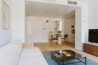 Telewizja i/lub zestaw kina domowego w obiekcie The Passage Apartments