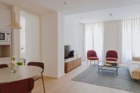 Telewizja i/lub zestaw kina domowego w obiekcie The Passage Apartments