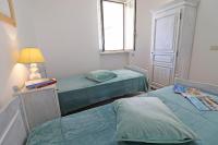 A bed or beds in a room at Casa Vacanza Black Magic Otranto