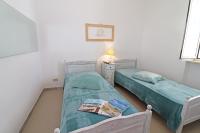 A bed or beds in a room at Casa Vacanza Black Magic Otranto