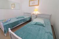A bed or beds in a room at Casa Vacanza Black Magic Otranto