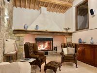 A seating area at Villa Podere Del Grasso