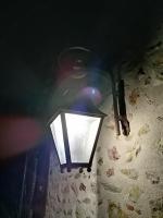 a lamp on a wall with a light on it at L&#39;auberge 10 à 15 pers 30min zoo beauval chambord cheverny in Langon