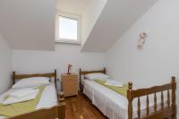 Postel nebo postele na pokoji v ubytování Apartment Zora