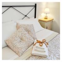 Posteľ alebo postele v izbe v ubytovaní LissaHouse Agriturismo