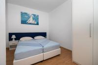 Posteľ alebo postele v izbe v ubytovaní Apartments Anita Tribunj