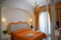 A bed or beds in a room at Villa Le Zagare Relais & SPA