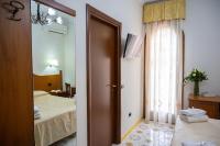 A bed or beds in a room at Villa Le Zagare Relais & SPA