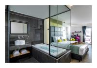 Posteľ alebo postele v izbe v ubytovaní Platinum Suites