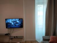 En TV eller et underholdningssystem p&aring; Cosystudio centre Ajaccio