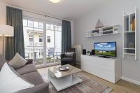 TV a/nebo společenská místnost v ubytování Strandstraße 32 Strandstraße 32-50