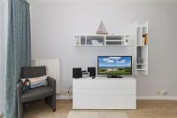 TV a/nebo společenská místnost v ubytování Strandstraße 32 Strandstraße 32-50