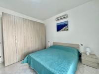 A bed or beds in a room at CASA VACANZE MARIAFRANCESCA