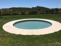 Bazén v ubytování Costa Esuri Golf Apartments nebo v jeho okolí