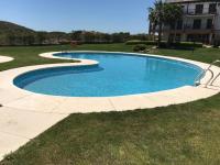 Bazén v ubytování Costa Esuri Golf Apartments nebo v jeho okolí
