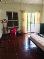 Postel nebo postele na pokoji v ubytování TAMONWAN HOUSE Koh Tao