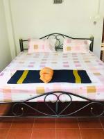 Postel nebo postele na pokoji v ubytování TAMONWAN HOUSE Koh Tao