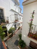 A balcony or terrace at Idyllic Townhouse in Marbella Old Town