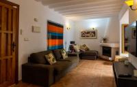 A seating area at Idyllic Townhouse in Marbella Old Town