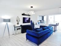 Televízia a/alebo spoločenská miestnosť v ubytovaní Apartments CVITA Holiday