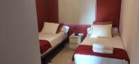 Postel nebo postele na pokoji v ubytování Villa Geneva - Relax y diversión