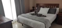 Postel nebo postele na pokoji v ubytování Villa Geneva - Relax y diversión