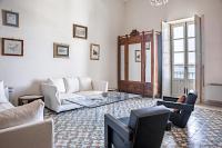 A seating area at Duplex sul porto grande by Wonderful Italy