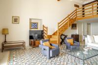A seating area at Duplex sul porto grande by Wonderful Italy