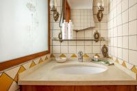 A bathroom at Duplex sul porto grande by Wonderful Italy