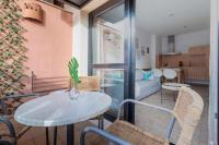 Posedenie v ubytovaní Apartamento 303 junto a la playa piscina y parking